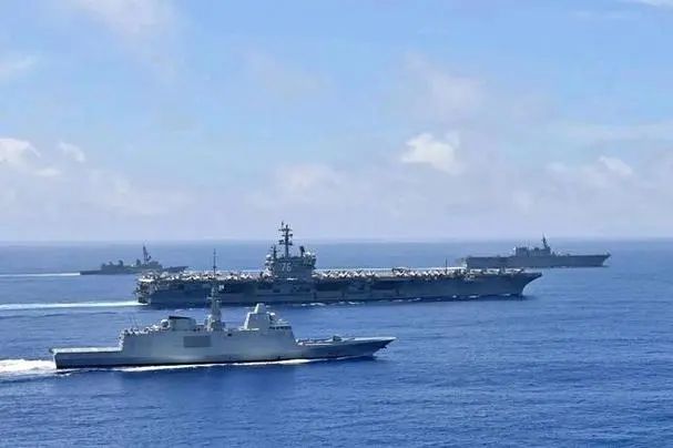 美国航母进入南海与中国的反应,为何中国不开炮?,美国航母南海行动引发中国反应,中国为何保持克制?